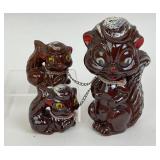 Skunk Family Figurines Linked Together