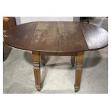Dropleaf table on casters