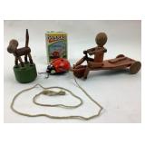 Hustler Pull Peddling Boy wooden and metal toy,