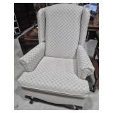 Wing Chair Featuring A Contemporary Neutral