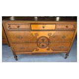 Wooden Dresser With Decorative Accents