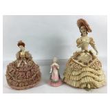Porcelain Figurines with Lace Detailing