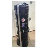 SKB hard golf travel case with wheels