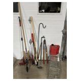 Animal trap, garden shears, loppers, rake, hoe