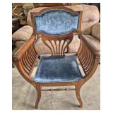 Oak Armchair, Featuring A Spindle Or Slat Back