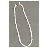 14k yellow gold & baroque pearl necklace. 18.75