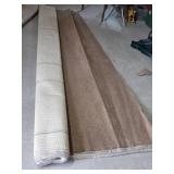 Rolls of Textured Beige Carpet Material