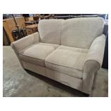 Beige Loveseat With Textured Weave Upholstery
