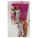 Pair of Barbie and Ken Dolls in Outfits and Barbie