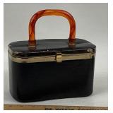 Black Hard Shell Handbag with Lucite Handle