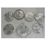 Lot of 7 silver Eagles