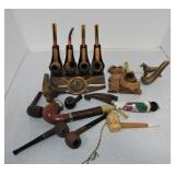 Lot of smoking pipes and pipe holders
