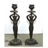 Pair of cast iron figural candle sticks, 9 1/2"
