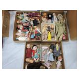 Large lot of small dolls