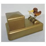 Mechanical bird cigarette dispenser