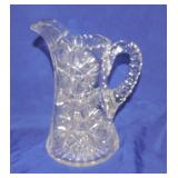 Cut glass water pitcher, 9", rim nick