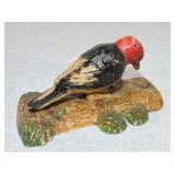 Cast iron woodpecker door knocker