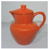 Red syrup pitcher with lid