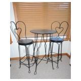 High tip wrought iron table and 2 bar stools