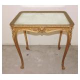 Gilded lamp table with mirrored top,
