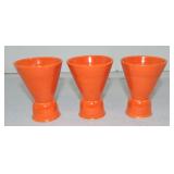 Harlequin lot of 3 double egg cups, red