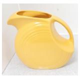 Vintage Fiesta disc water pitcher, yellow