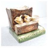 Majolica pigs at feed trough match holder
