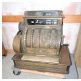 National large brass cash register, 25'w, 23'h