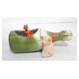 German porcelain pink pig with devil in a bottle