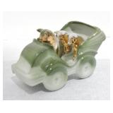 German porcelain pink pig with automobile