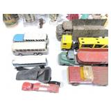 Lot of 5 toy trucks, 3 buses, and pistol
