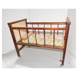 Wooden doll crib