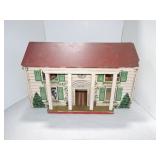Wood and fiberboard dollhouse with