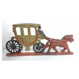 Cast iron stagecoach door stop