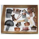 Tray of hair combs including Bakelite