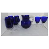 Cobalt glass pitcher with clear applied handle and