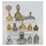 Lot of 12 perfume bottles with silver or brass