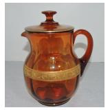 Amber glass lemonade pitcher with lid and