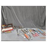 Sockets,  Pliers, Wire Cutters, Files, Spark Plug