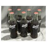 (7) Coca- Cola Bottles- Different