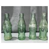 (4) Coca-Cola glass bottles Cleveland, Ohio