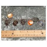 925 sterling silver charm bracelet 25.28 grams .