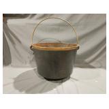 Antique three-legged cauldron