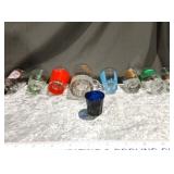 Vintage Cobalt blue shot glass alongside 8 logo