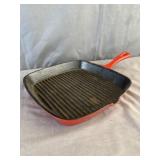 Unmarked Red Enamel Bacon Cast Iron Skillet