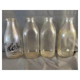 (4) Assorted Quart Milk Bottles