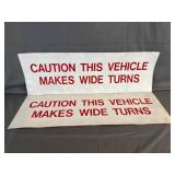 (2) "Caution This Vehicle Makes Wide Turns"