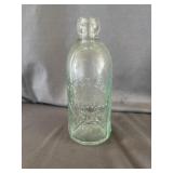Joyce Bros. Hutchinson Glass Beverage Bottle