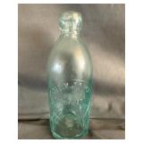 Geo. V. Joyce Hutchinson Glass Beverage Bottle