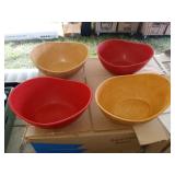 Red and yellow hard plastic serving bowls